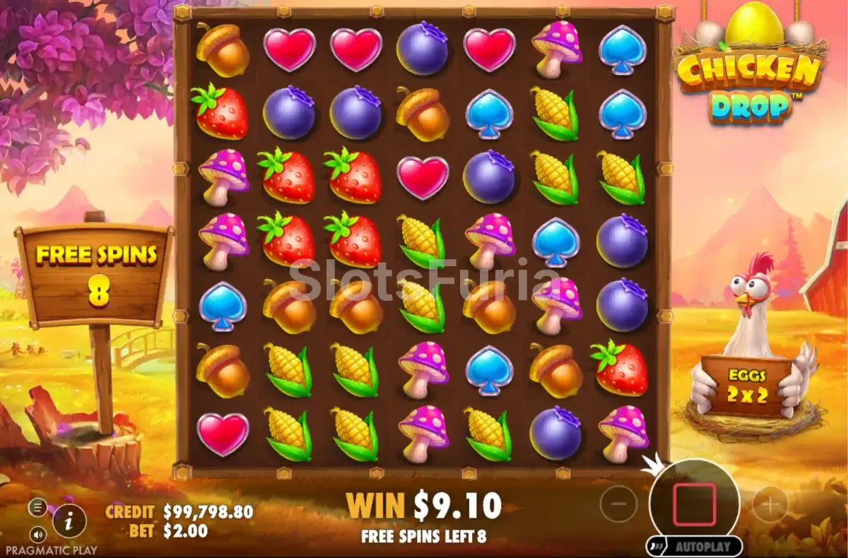 Ronda de giros gratis de Chicken Drop con huevo cayendo sobre el tablero
