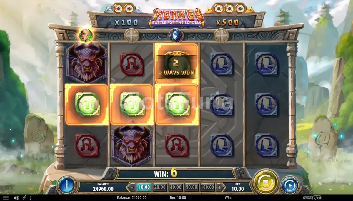 Resultado de giro con símbolos ganadores en Monkey Battle for the Scrolls