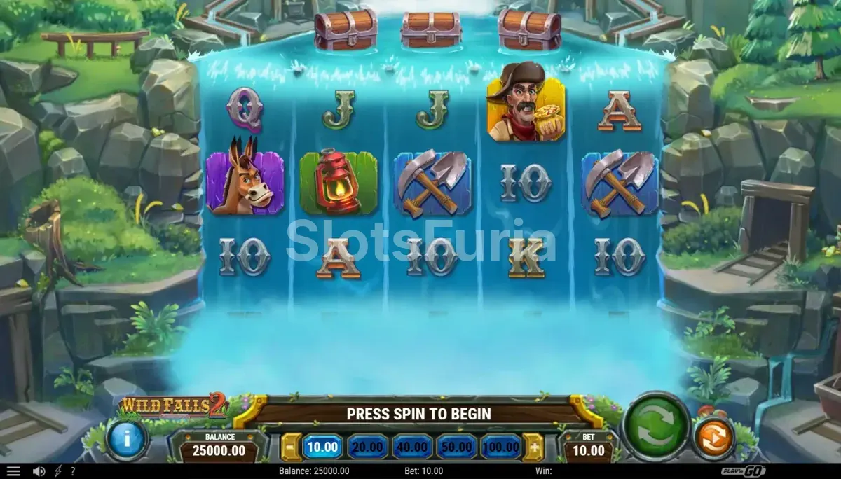 Juego base de Wild Falls 2 con los cinco carretes y el paisaje del Yukón